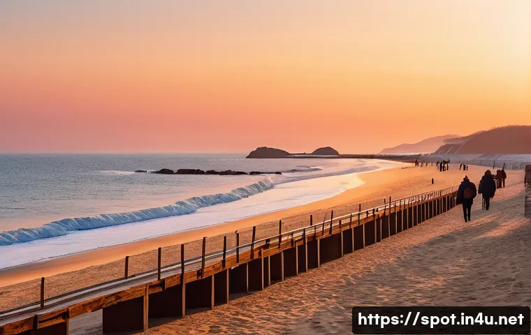 정동진 해돋이 명소 - A breathtaking sunrise scene at Jeongdongjin beach near the train station, featuring a wide sandy sh...