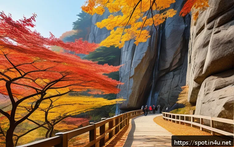 청송 주왕산 단풍 명소 - A serene autumn hiking trail at Juwangsan Mountain featuring towering jagged rock formations and vib...